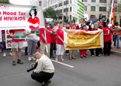 Nurses Dressed as Robin Hood Demand a Financial Transaction Tax