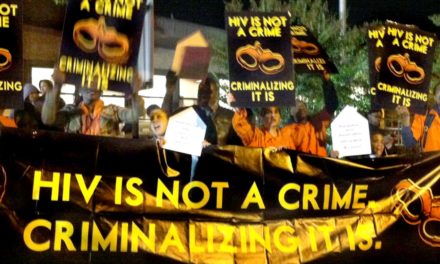 AIDS Activists Dressed In Orange Prison Jumpsuits Flood Site of Presidential Debate: Demand an End To HIV Criminalization