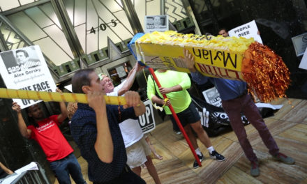 AIDS Activists Smash Epipen Piñata Filled With Coins Outside Mylan Pharma