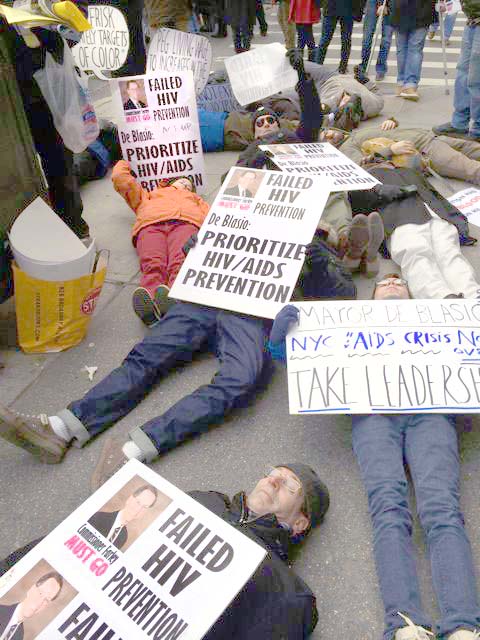 ACT UP members with signs